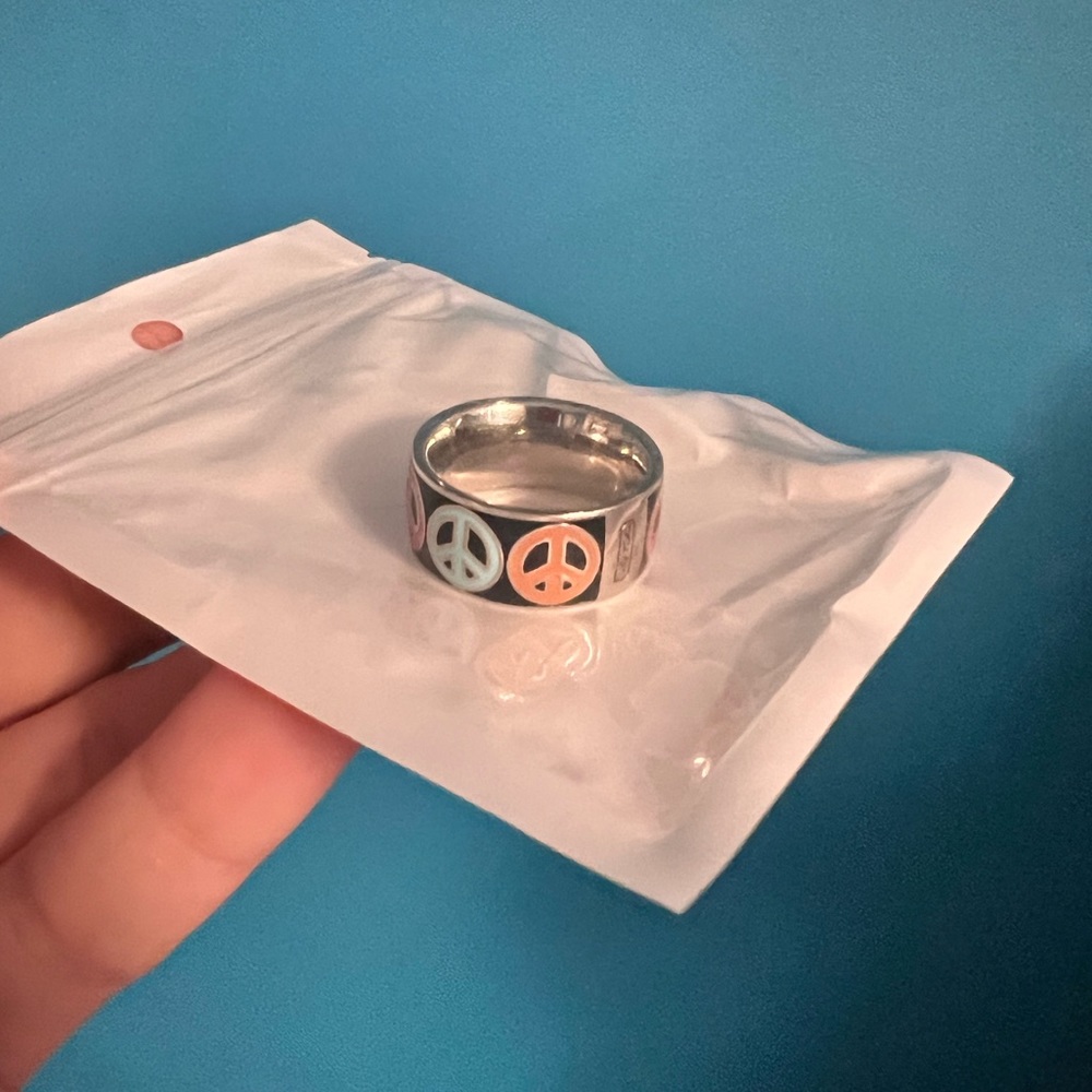 Coach enameled peace sign ring